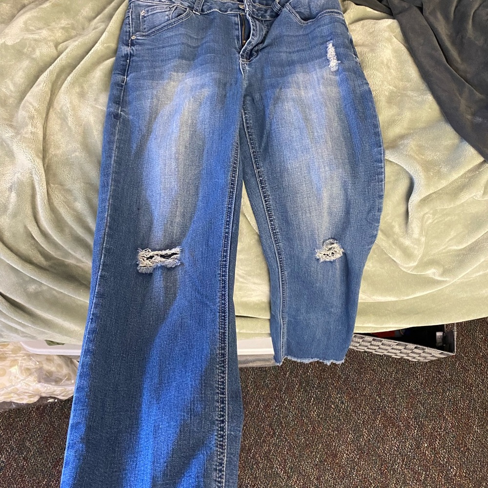 Blue jeans with rips